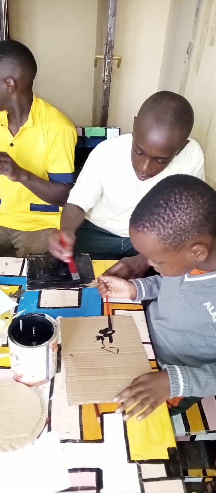 Children engaged in painting activities