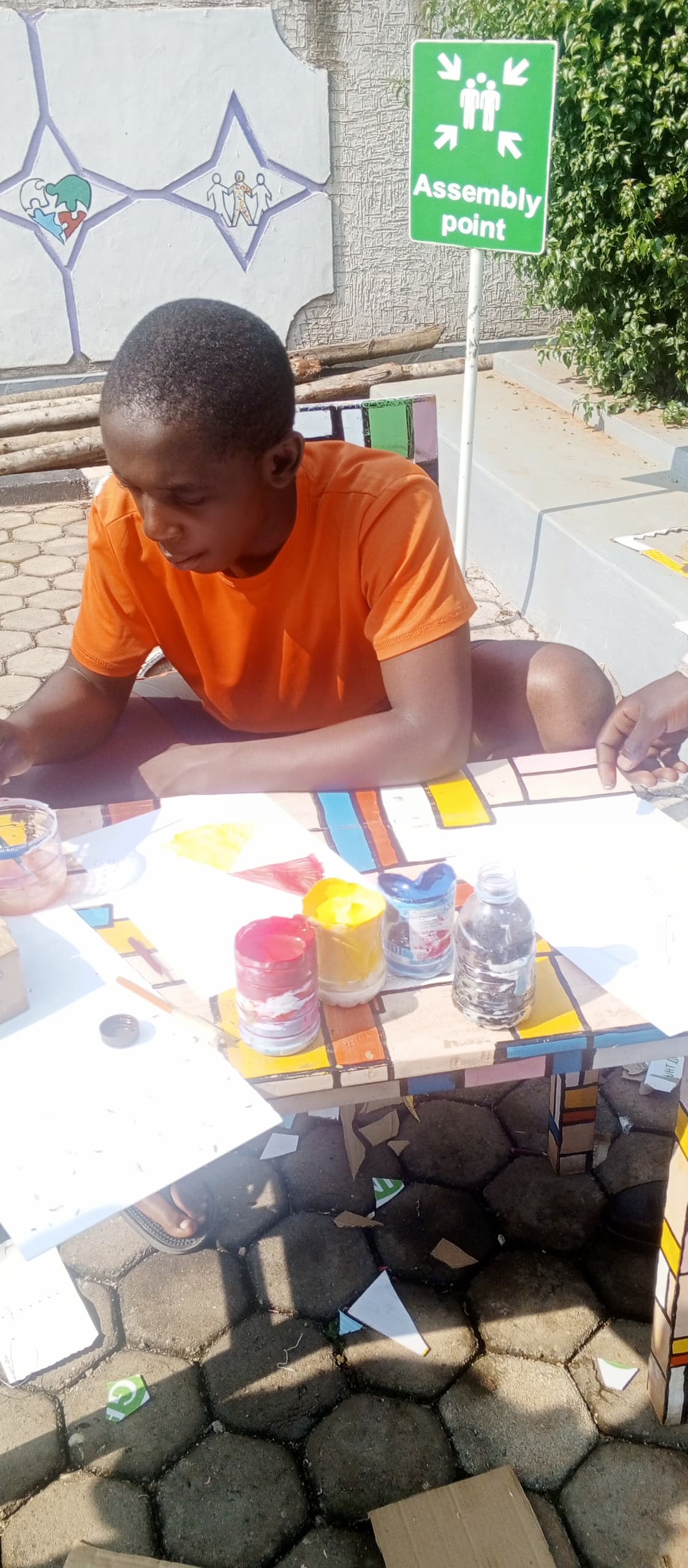 Children engaged in painting activities