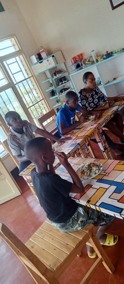 Children learning table setting
